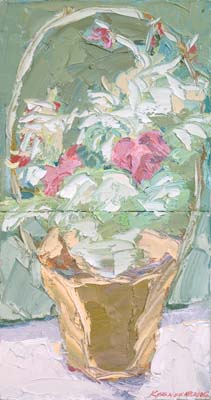 Bouquet festif dans un panier à fleurs.